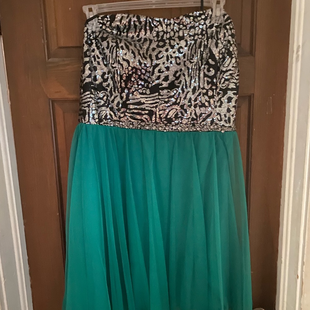 Cheetah print with a green flowing skirt